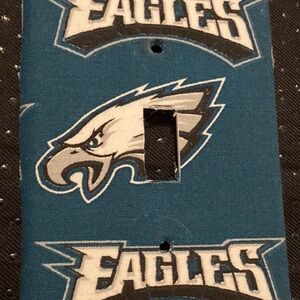 THESE ARE LIGHT SWITCH COVERS COVERED IN FABRIC